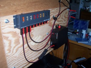 Rigrunner 4008H mounted on rear of desk to replace all 12 V DC wall warts