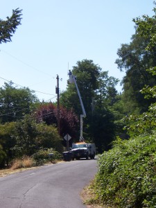 Power Company fixing issues on power pole